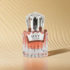Close-up of Elianto Sexy Queen EDP bottle showcasing elegant design and soft pink tones.