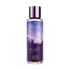 Perfume bottle with purple label featuring a night sky and trees on a white background